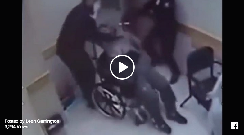cop beating wheelchair man